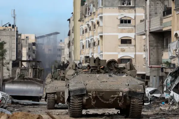 Israeli tanks in Gaza City in the Gaza Strip, November 22, 2023 [Ronen Zvulun/Reuters]