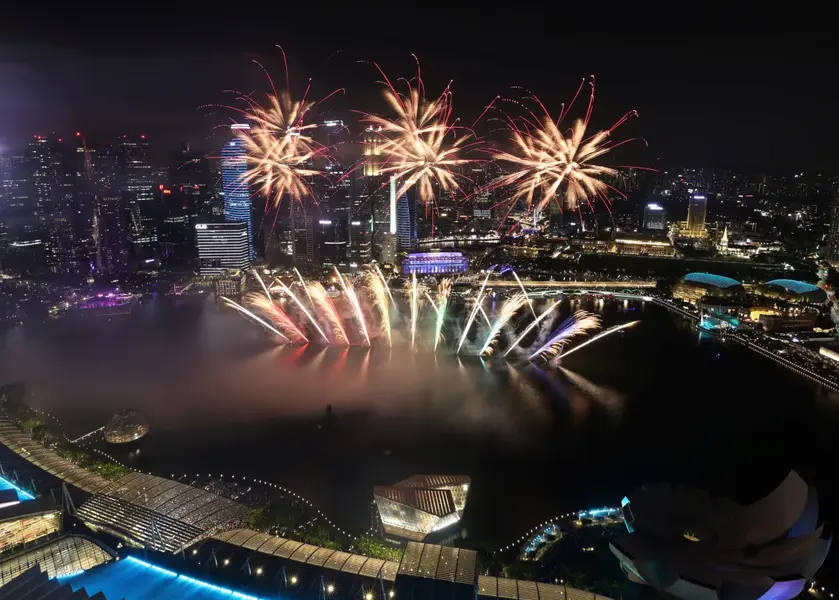 Fireworks light up the Marina Bay ahead of the New Year celebrations in Singapore. [Edgar Su/Reuters]