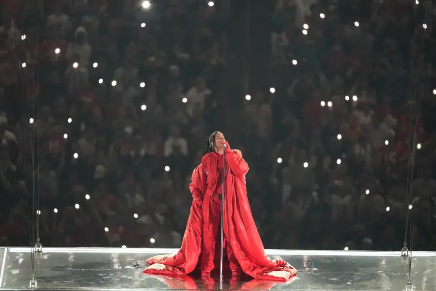 Pop superstar Rihanna performed hits from Umbrella to Diamonds as she wowed the Super Bowl halftime crowd during her first live performance in seven years, February 12, Glendale, Arizona. The Kansas City Chiefs beat the Philadelphia Eagles 38-35. [Charlie Riedel/AP Photo]
