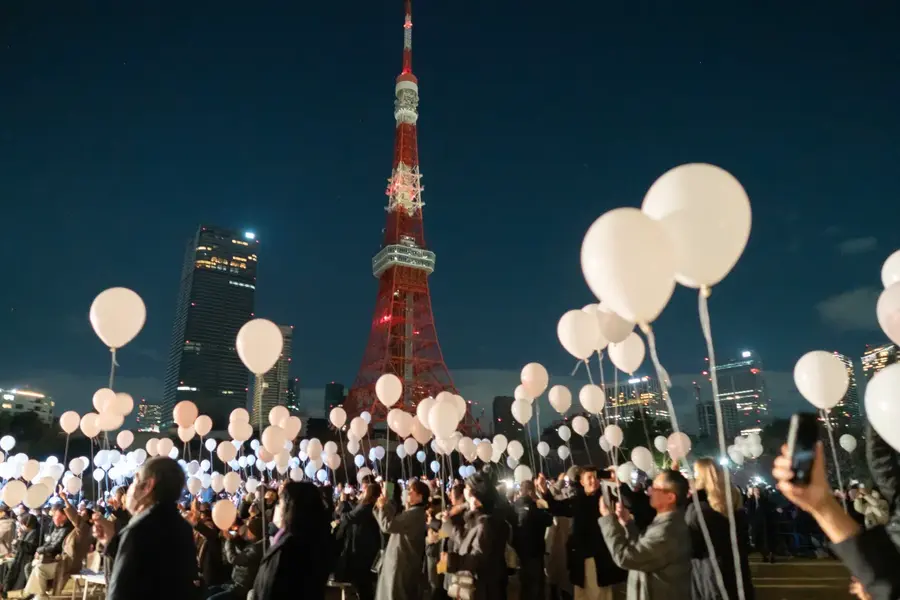 People release balloons in front of the Tokyo Tower during a countdown event. People in Tokyo celebrated the arrival of the Year of the Dragon, the zodiac sign of 2024.[Tomohiro Ohsumi/Getty Images]