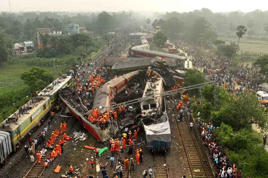 Rescuers work at the site of passenger train accident, in Balasore district, in the eastern Indian state of Odisha, on June 3. Rescuers waded through piles of debris and wreckage to pull out bodies and free people after two passenger trains derailed, killing more than 280 people. Hundreds of others were trapped inside more than a dozen mangled rail cars, in one of the country's deadliest train crashes in decades. [Arabinda Mahapatra/AP Photo]