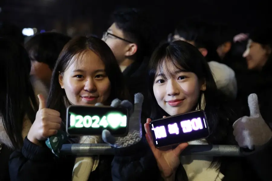 People attend a ceremony to celebrate the New Year in Seoul, South Korea [Kim Hong-Ji/Reuters]